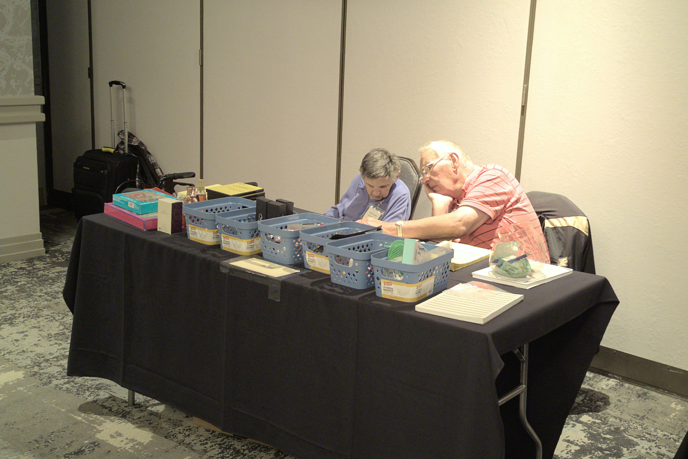 Don and Gerry Koors seated at the ACBI exhibit table.